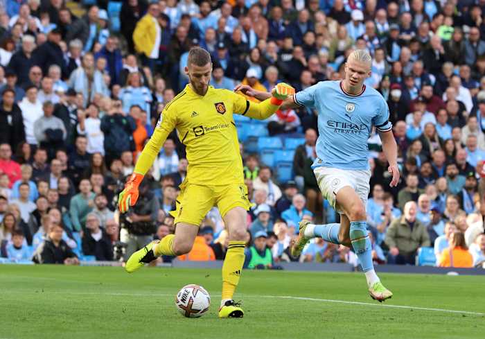 David de Gea (left) and Erling Haaland pictured during a Premier League game between Manchester City and Manchester United in October 2022